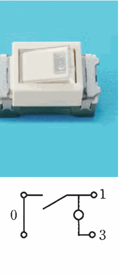 白色の器具の写真。ハンドルに小さな窓がある。下の図は,左に0の字と上下2つの端子を縦線で結んだ部分があり,その上の端子から出た線と右の1の端子へ続く線の間が斜めの線で開いた接点になっていて,1の端子へ続く線から下へ白丸を経て3の端子に至る構成