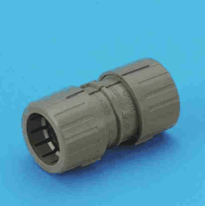 灰褐色の樹脂製の筒形の部品。両端に縦の溝の入った太い部分があり,中央が少し細い